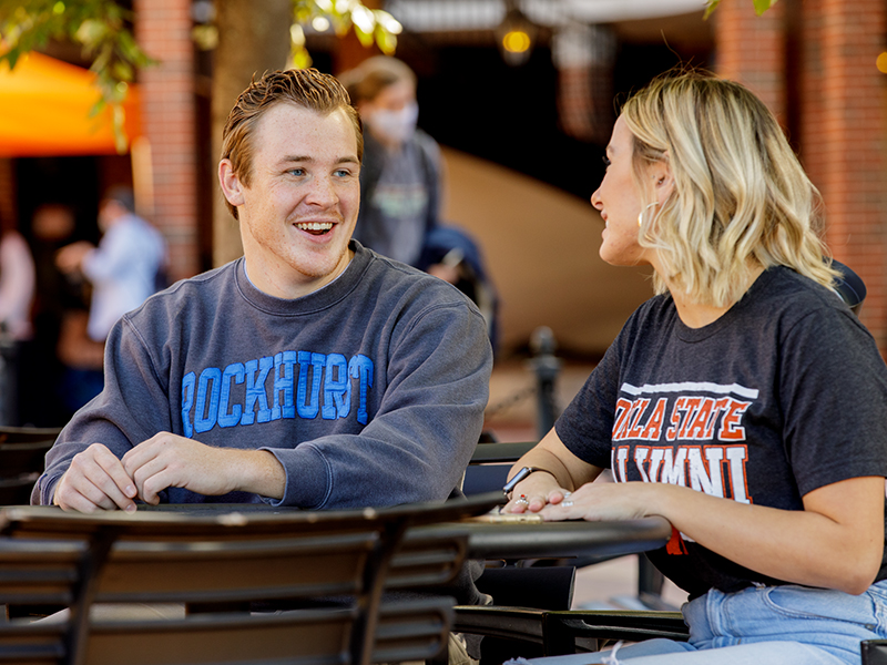 Two grad students outside
