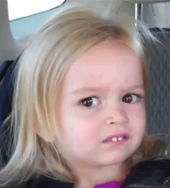 Little girl making stink face with math problems appearing on the screen. Little girl making stink face with math problems appearing on the screen.